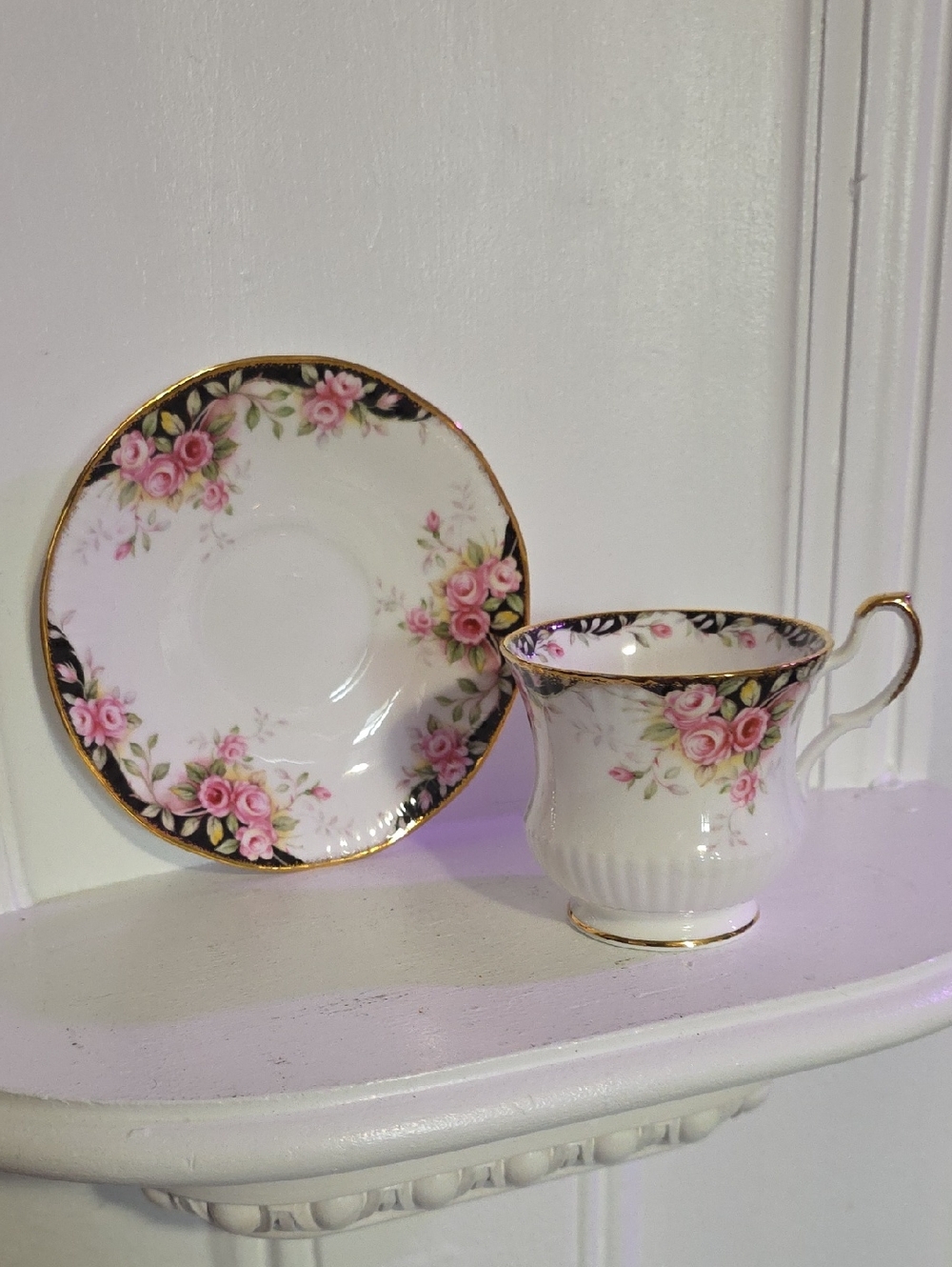 vintage Queen's Fine Bone China tea cup and saucer set in the Midnight Rose